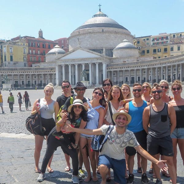 A group standing in front of Piazza del Plebiscito