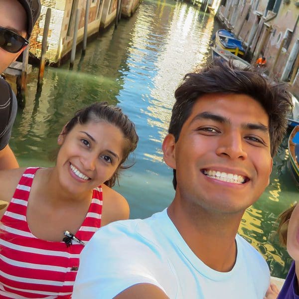 A group selfie on a bridge in Venice